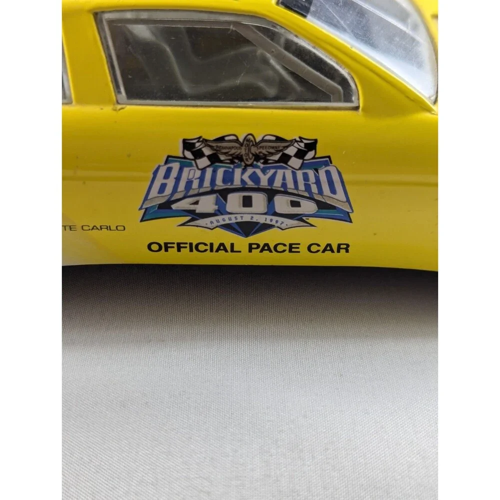1996 Racing Champions Chevrolet BriCkyard 400 1:64 Monte Carlo Car Yellow